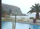 Comodoro - View of pool & sea from the bar